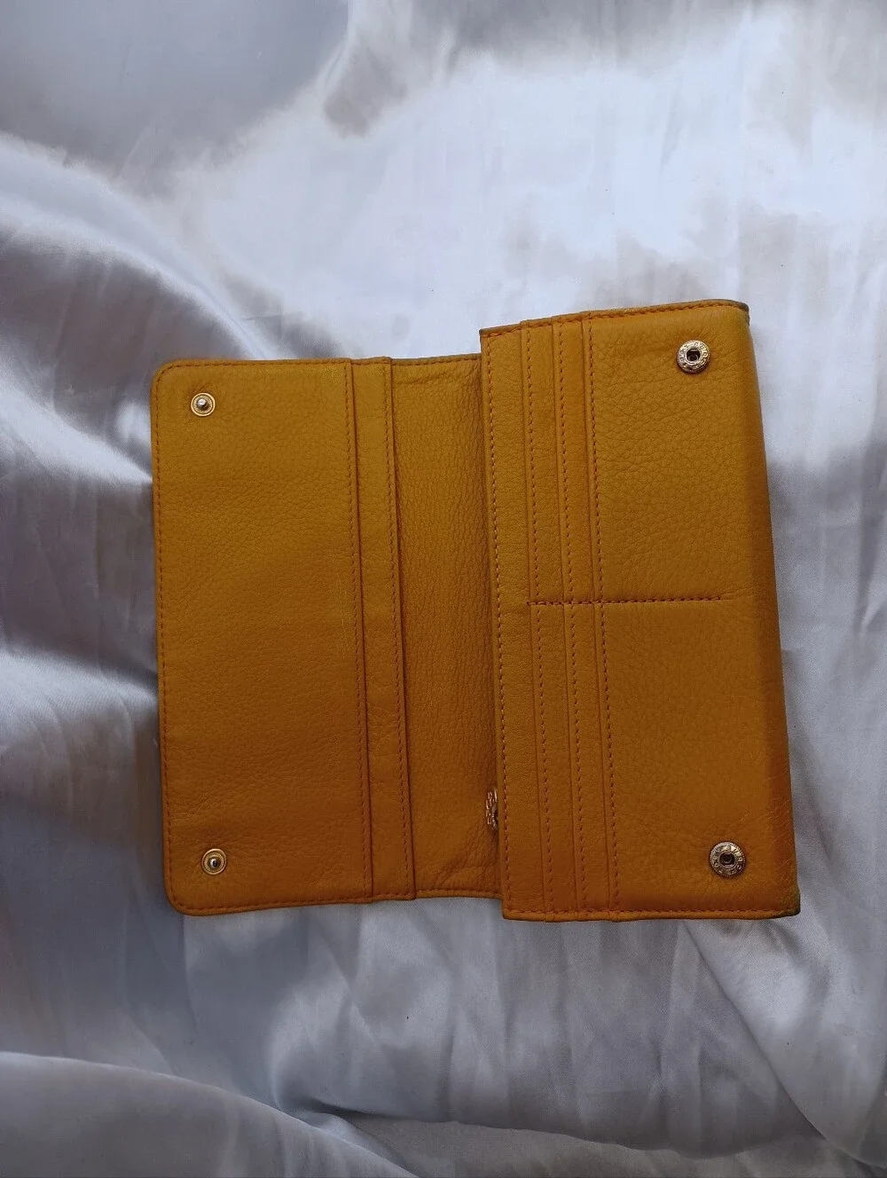 Tory Burch Marion Perforated Leather Zip Continental Wallet in a Mustard Yellow
